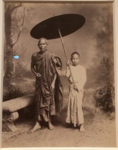 1887 Buddhist with Parasol